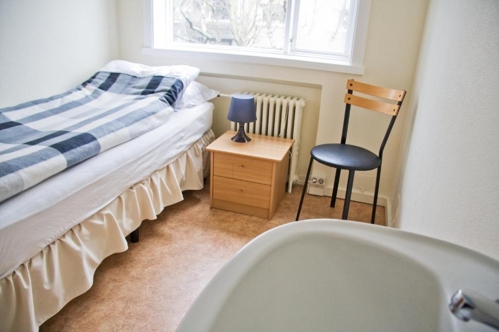 Habitación Individual con baño compartido