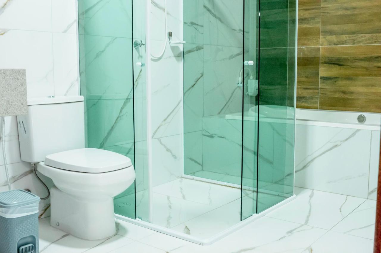 Quarto Triplo com Banheira