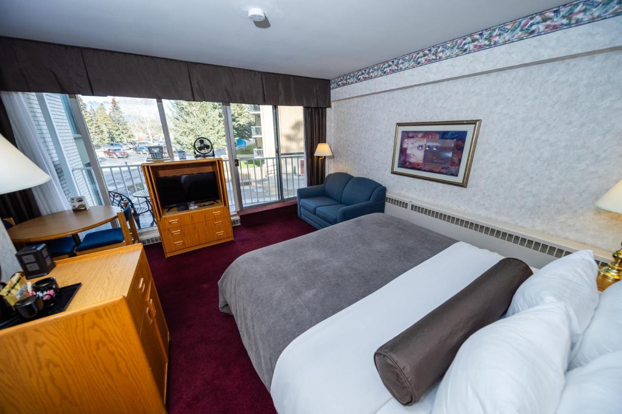 Kamer met Kingsize Bed en Uitzicht op de Bergen