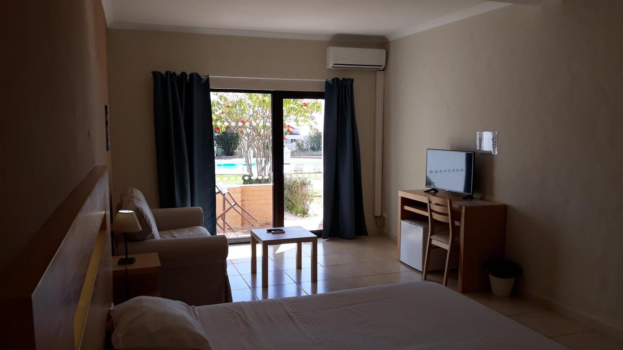Double or Twin Room Pool View,779767074:JPEG