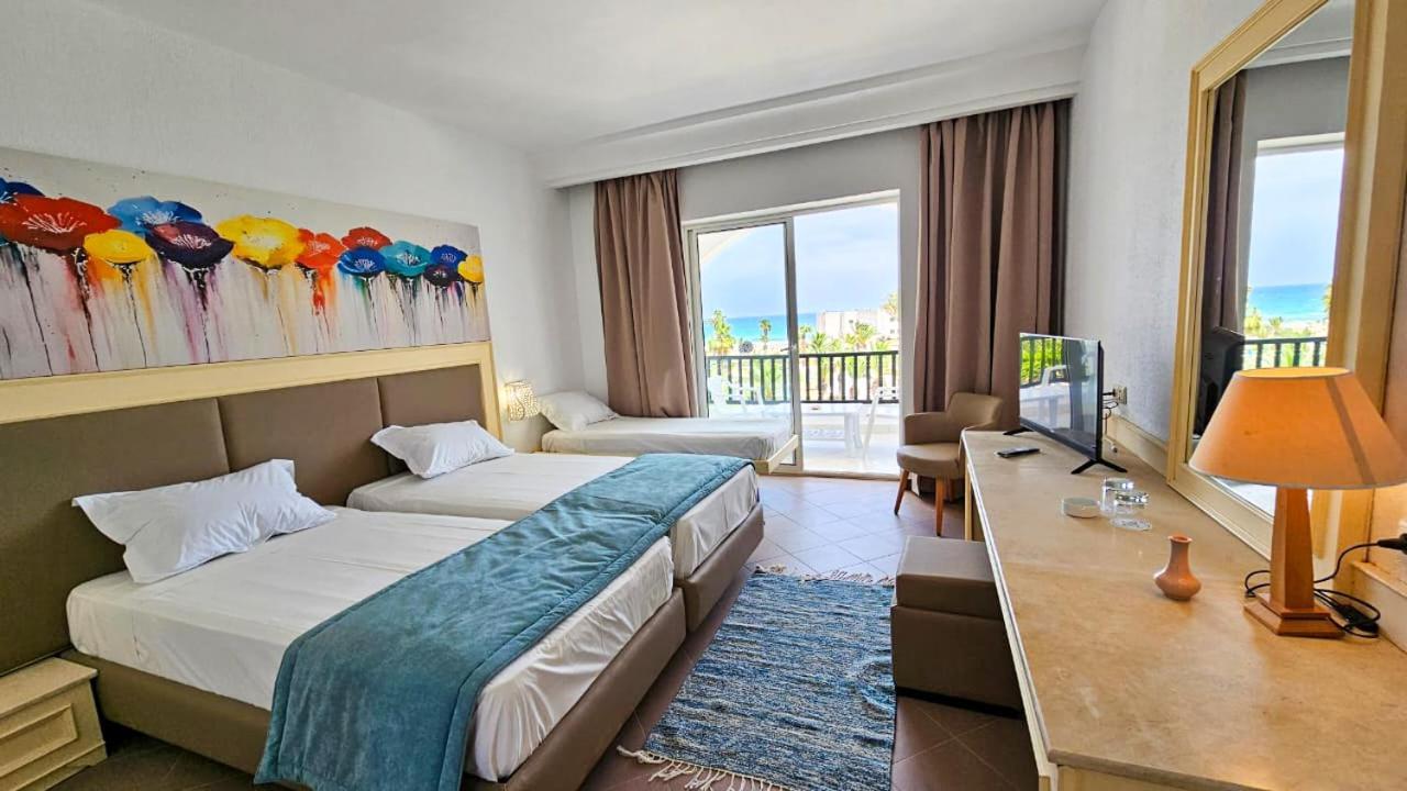 Dreibettzimmer mit Meerblick