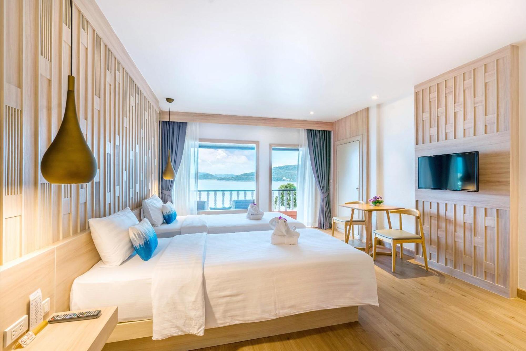 Deluxe Tweepersoonskamer met 2 Aparte Bedden en Uitzicht op Zee