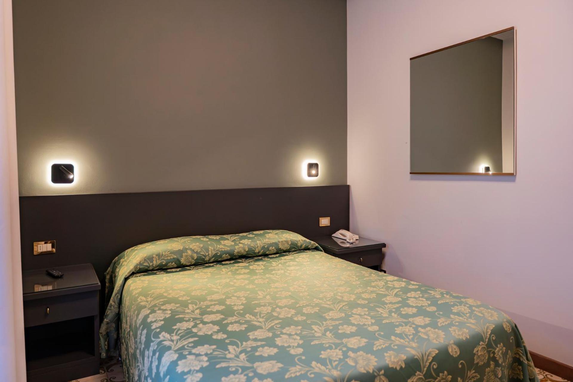 Kamer met Queensize Bed en Balkon