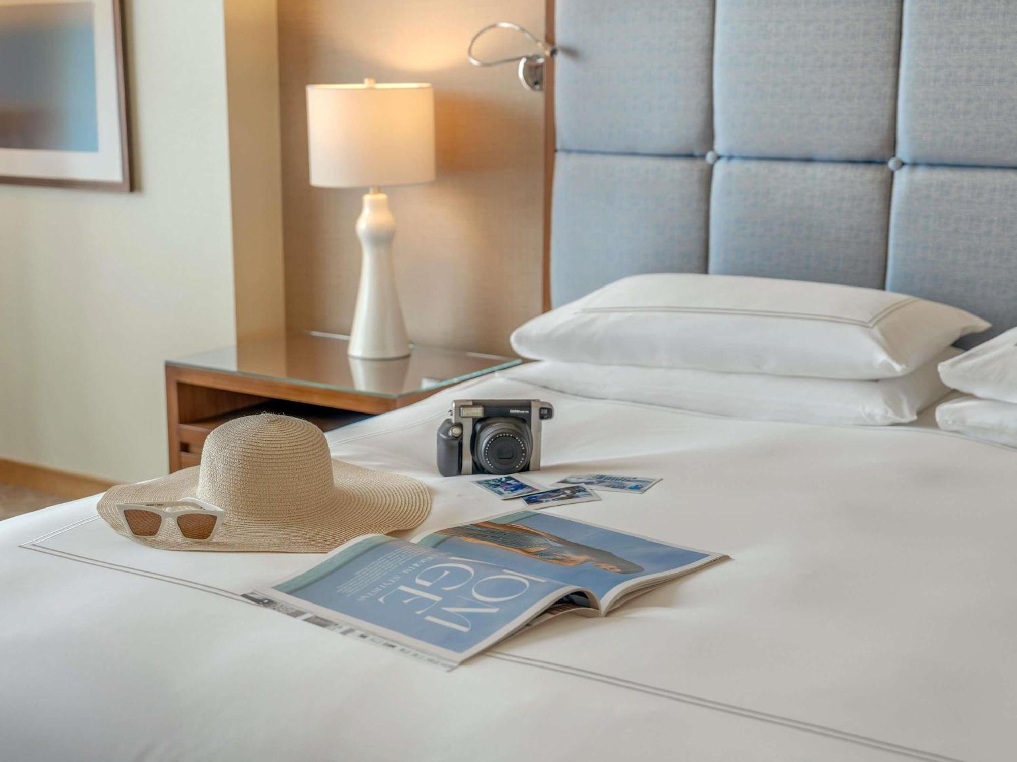 Deluxe Zimmer mit Kingsize-Bett und Stadtblick