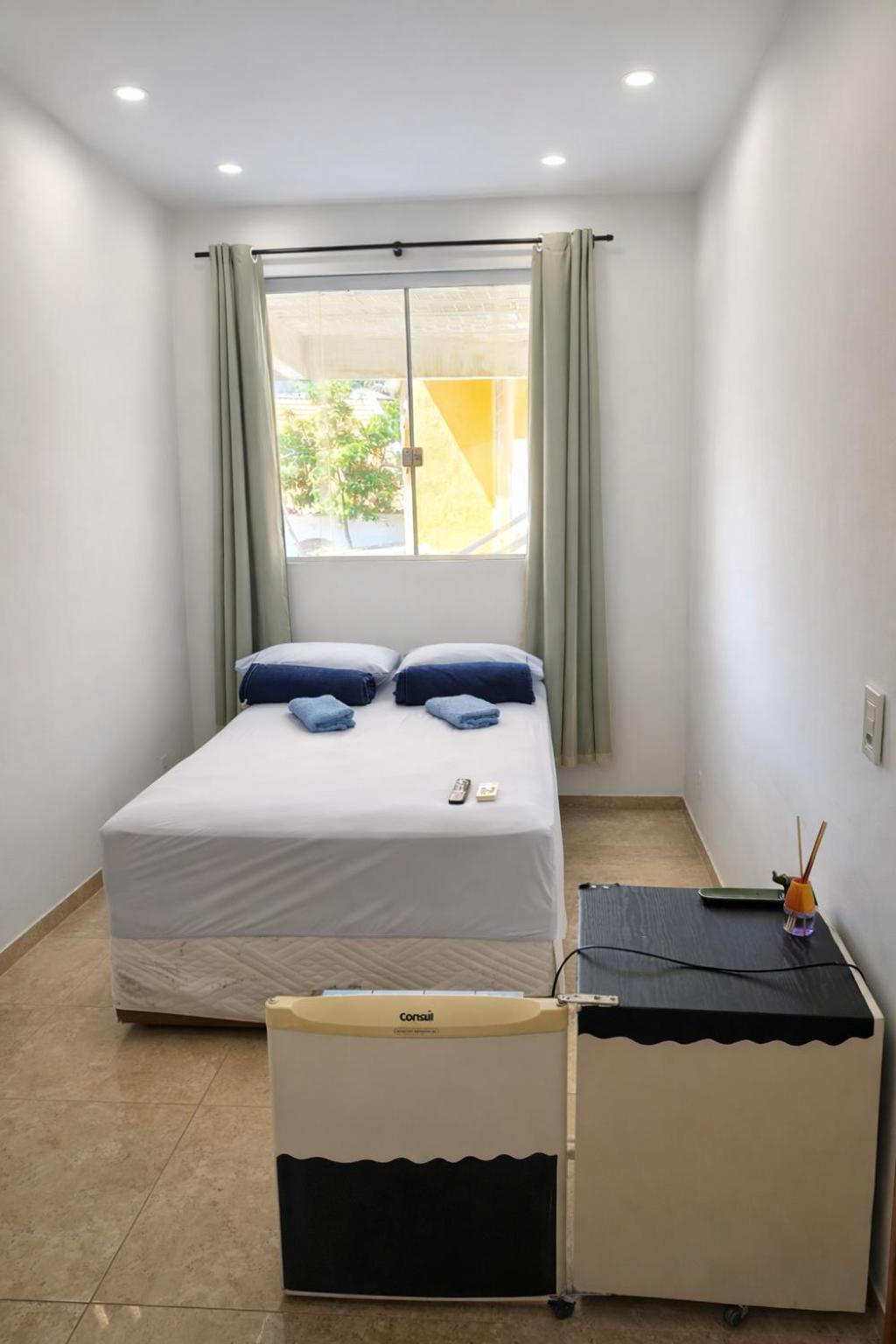 Quarto Individual Econômico