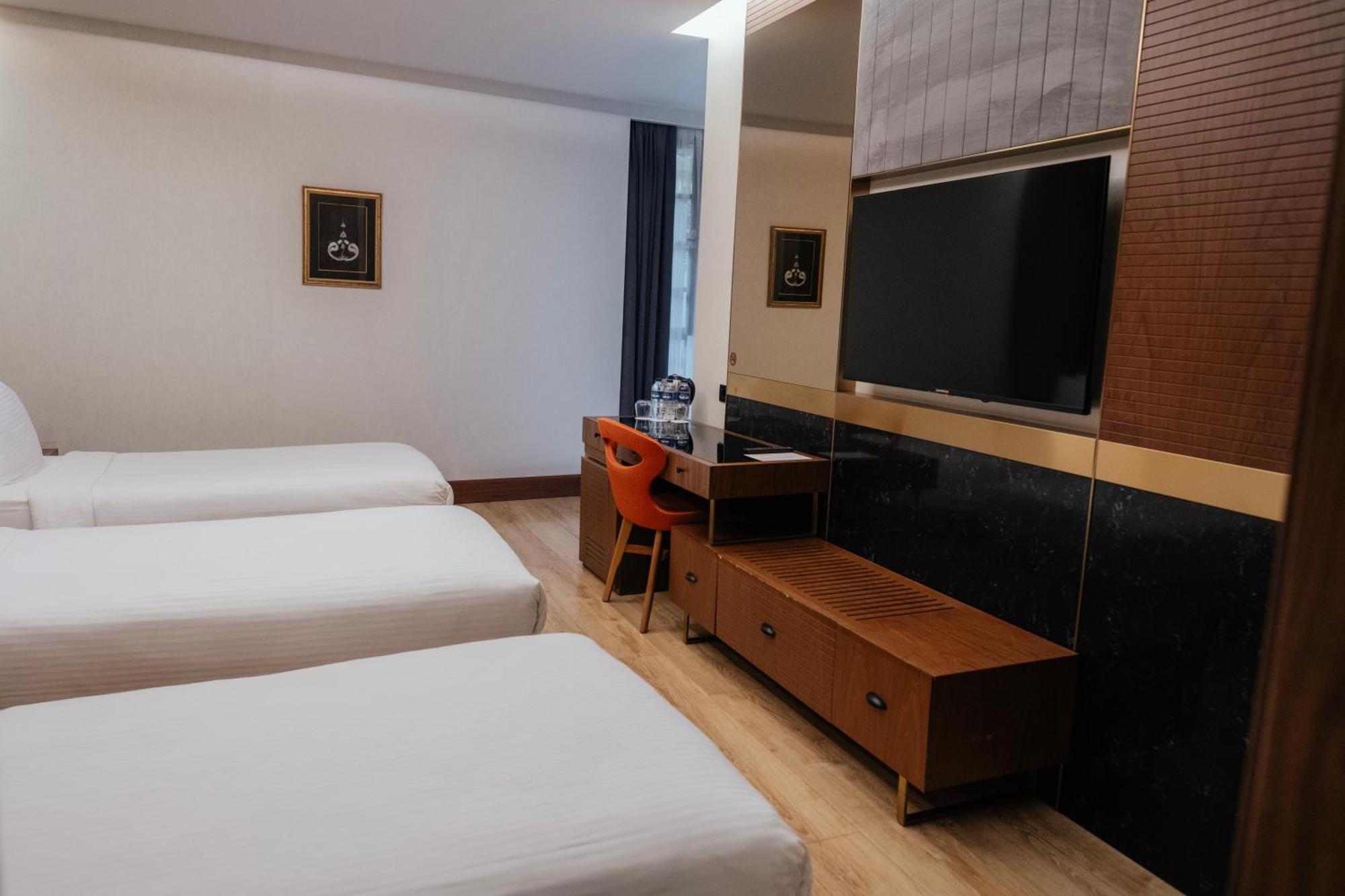 Premier Dreibettzimmer
