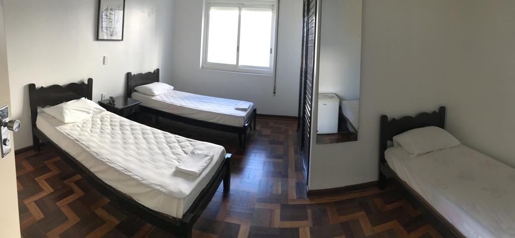 Habitación Triple con vistas parciales al mar