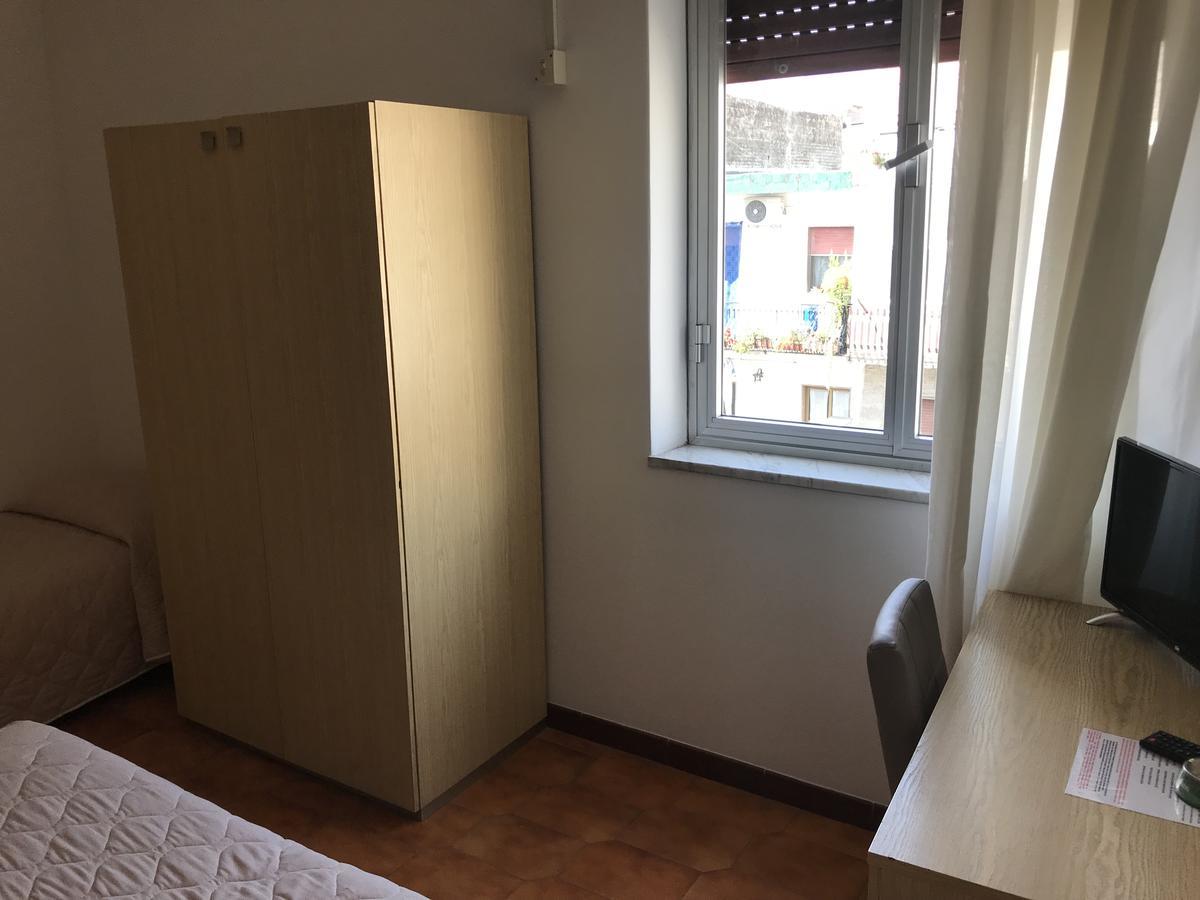 Economy Triple Room Interior Patio View