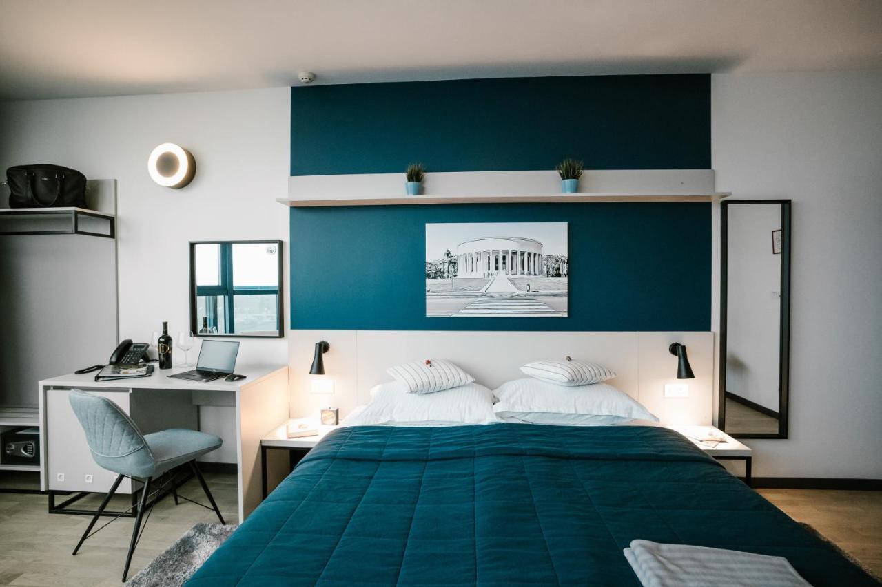 Kamer met 1 Groot Bed of 2 Aparte Bedden en Uitzicht op de Stad