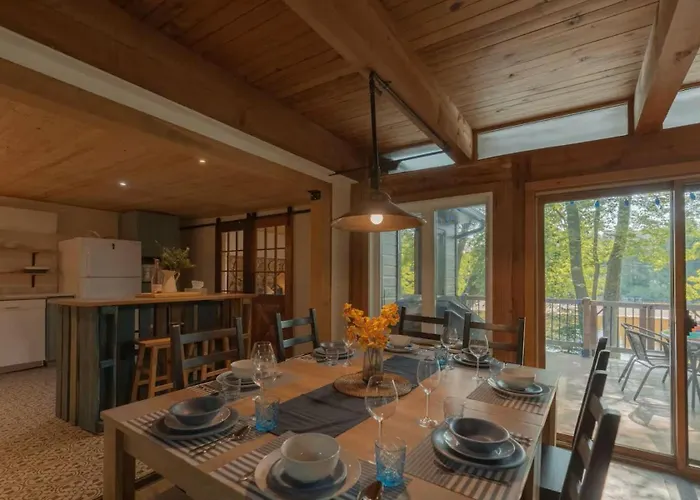 Riverfront Getaway With Hot Tub And Scenic Views