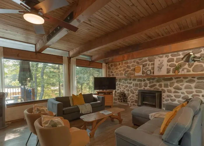 Riverfront Getaway With Hot Tub And Scenic Views